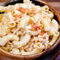 Lobster Mac & Cheese · Our homemade lobster mac & cheese is ooey and gooey, full of cheese and real lobster meat th...