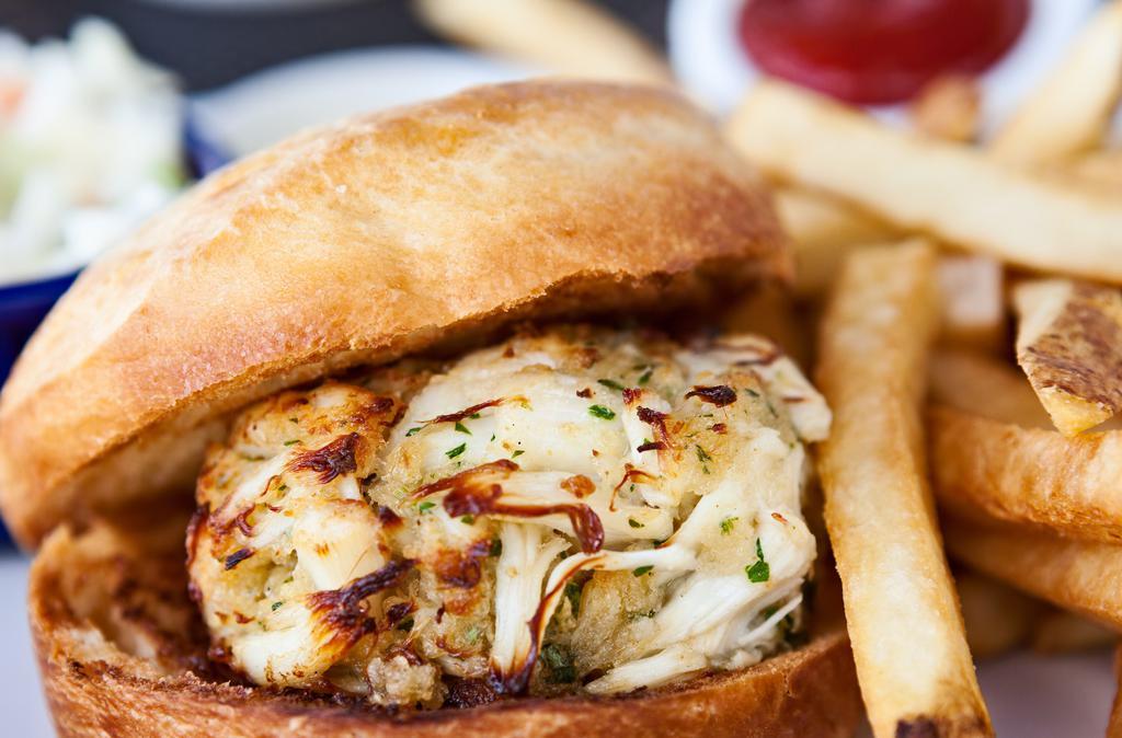 Jumbo Lump Crab Cake Sandwich · Classic Maryland-style crab cake (8 Oz.) with both lump and jumbo lump.
Served on a Brioche bun with lettuce,  tomato, fries.