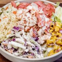 Lobster Bowl · Lobster meat blended with Aioli served over greens, corn salsa, tomato, rice, dressing.