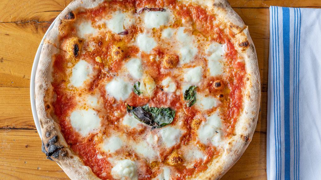 Margherita Pizza · Mozzarella, Tomato, Basil
