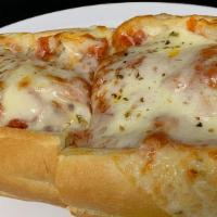 Meatball Grinder · Served on a bread roll.