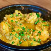 Shrimp Fahsah · Sauteed shrimp with assorted potatoes & Okra served with whipped fenugreek (Hulba) presented...