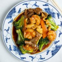 Triple Delicious With Broccoli · Shrimp, chicken, and beef with broccoli in garlic brown sauce. Served with white rice.