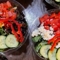 Greek Salad · Large Bowl of Mixed greens with bell pepper, cucumber, red onion, tomato, olives, and feta c...