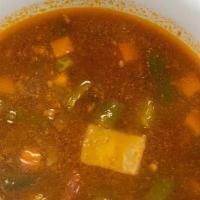 Sopa De Res / Beef Soup · Una sopa de carne de vaca de costilla con verduras. / A short-rib beef soup with vegetables.