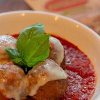 Meatball Parmesan · Meatballs in marinara, topped with mozzarella and parmesan.