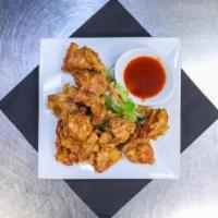 Tori Karaage · Japanese-style fried chicken and sweet and spicy sauce.