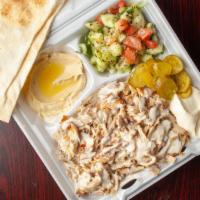 Chicken Shawarma Plate · Seasoned chicken cooked slowly on a vertical rotisserie and thinly sliced with pickles, fres...