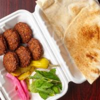 Falafel (6 Pieces) · Served with bread.