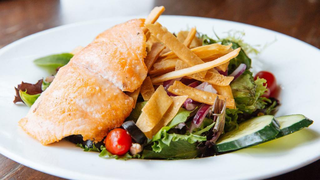 Salmon · Grilled Salmon Mixed Greens, Tomato, Red Onion, Cucumber, Crisp Wontons, Side Soy-Lemon Vinaigrette.  Consuming Raw Or Undercooked Meats, Poultry, Seafoods, Eggs, Or Unpasteurized Milk May Increase Your Risk Of Foodborne Illness.