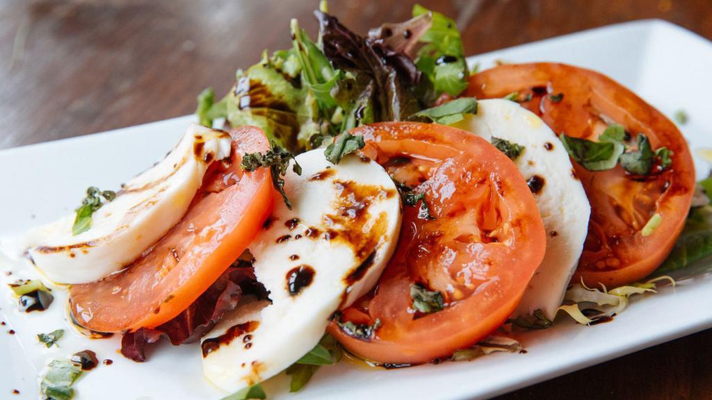 Caprese · Fresh Mozzarella, Beefsteak Tomato, Basil, Drizzled with a Sweet Balsamic reduction