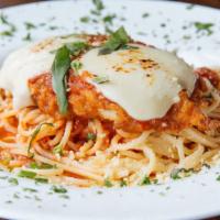 Chicken Parmesan · Lightly Breaded Chicken Breast, Spaghetti, Homemade Marinara & mozzarella