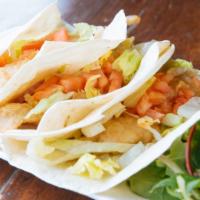 Fish Tacos · Crispy Fried Cod, Romaine Lettuce, Tomatoes & Chipotle Aioli with Side Greens