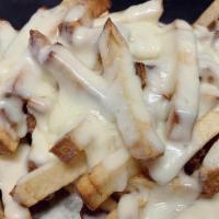 Mozzarella Cheese Fries · Fresh cut french fries topped with melted Mozzarella Cheese.