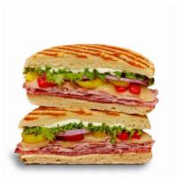 Italian Coldcut Panini · shaved ham, salami, mayo, provolone cheese, lettuce, red onions, roasted red peppers, banana...