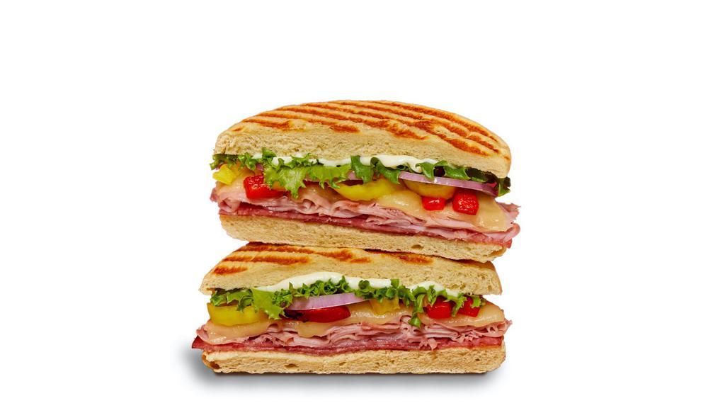 Italian Coldcut Panini · shaved ham, salami, mayo, provolone cheese, lettuce, red onions, roasted red peppers, banana peppers