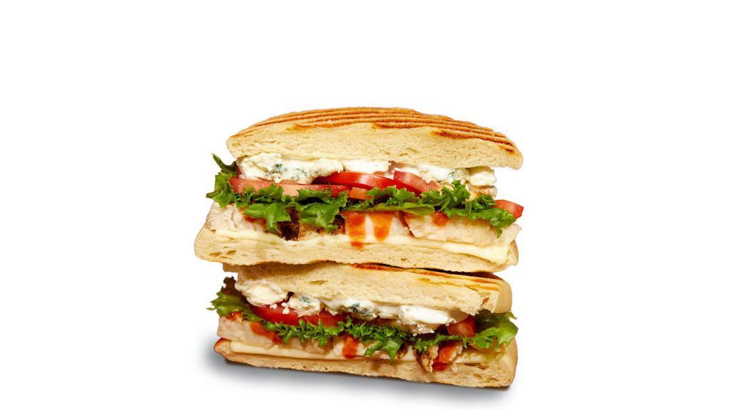 Buffalo Chicken Panini · roasted chicken, buffalo sauce, buttermilk ranch, american cheese, crumbled blue cheese, lettuce, tomatoes