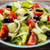 Greek Salad · Gluten free. Lettuce mix, feta cheese, kalamata olives, tomatoes, cucumber, onion and banana...