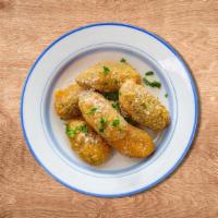 Golden Jalapenos Poppers  · Fresh jalapenos, seasoned, coated with crumbs and fried till crisp and golden fried.