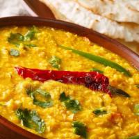 Dal Tadka · Vegan, gluten free. Yellow lentil tempered with Indian spices and tomatoes, Indian herbs and...