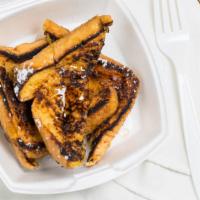 French Toast · 2 slices of Texas toast dipped in our famous house-made French toast batter.