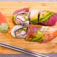Rainbow Roll · California rill topped with tuna, salmon, white tuna & avocado.