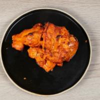 Chicken Tikka · Grilled chicken marinated in yogurt, traditional Indian herbs, spices.
