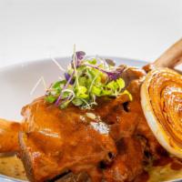 Lamb Shanks With Rogan Josh · Prepared by slow cooking tender lamb shanks and served in a creamy rogan josh sauce packed w...