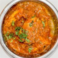 Chicken Curry · Boneless chicken cooked in a thick curry sauce.
