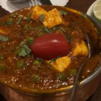 Dal Makhni · Lentils cooked with fresh herbs and spices, sautÃ©ed in butter and garnished with fresh cori...