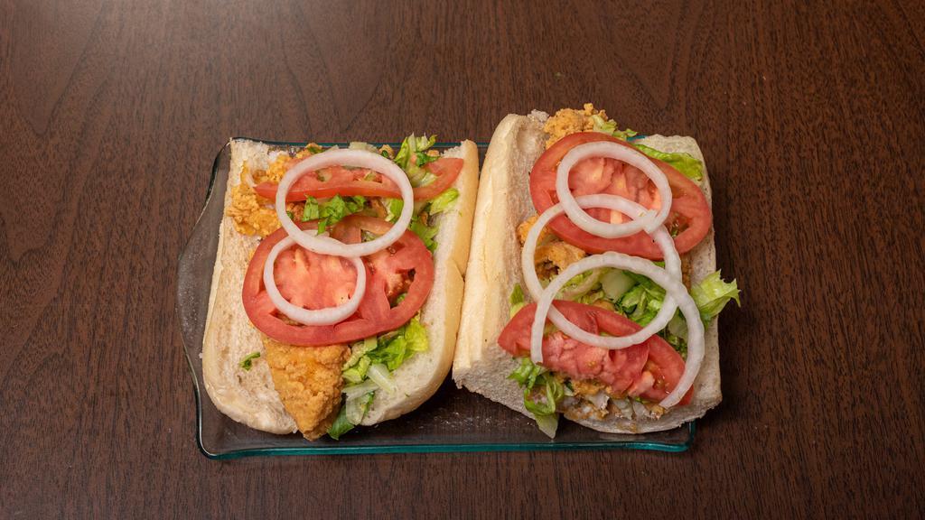Whiting Or Swai Fish Hoagie With Fries · Fried fish on a Hoagie roll with  Spring mix lettuce and tomatoes