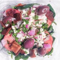 Spinach Salad Container · Spinach, with red and green peppers, tomatoes, red onions, olives, stuffed grape leaves, fet...