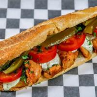 Chicken Shish Tawook Maroosh Way · Grilled chicken with sauteed onions, garlic sauce, tomatoes, parsley, and pickles on a toast...