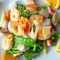 Seafood Combination · Shrimp, lobster meat, scallop, crab meat, sauteed with chinese vegetables and white sauce.