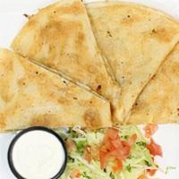 Chicken Quesadilla · Served with sides of sour cream and salsa.