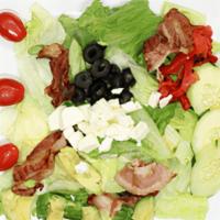 Greek Salad · Lettuce, tomato, onion, cucumber, roasted pepper, crouton, green pepper, egg & feta cheese.