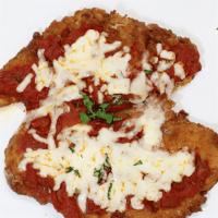 Chicken Parmigiana · Breaded chicken cutlet topped with sauce & mozzarella cheese.