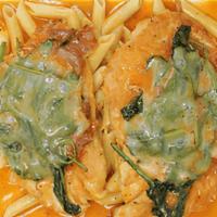 Chicken Saltimboca · Sautéed Chicken breast topped with spinach, prosciutto & provolone cheese in a rich marsala ...