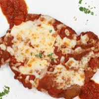 Veal Parmigiana · Breaded veal cutlet topped with sauce & mozzarella cheese.