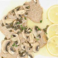 Veal Piccata · Veal medallions sautéed with capers & mushrooms in a white wine lemon butter sauce.