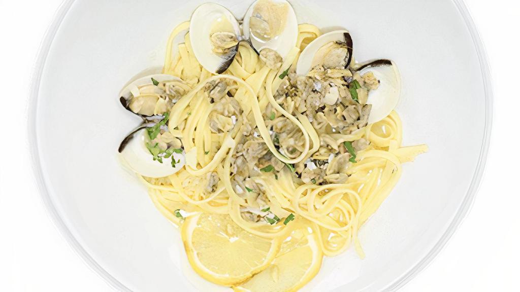 Linguini W Clam Sauce · Chopped baby clams with garlic & white wine in a red or white sauce.