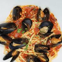 Mussels Fra Diavolo · Mussels sautéed in a zesty marinara sauce.
