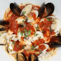 Seafood Combo · Sautéed mussels, clams, shrimp & calamari with garlic in a red or white sauce.