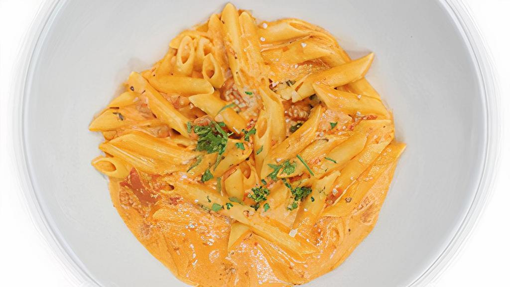Penne Alla Vodka · Penne tossed with vodka cream sauce.