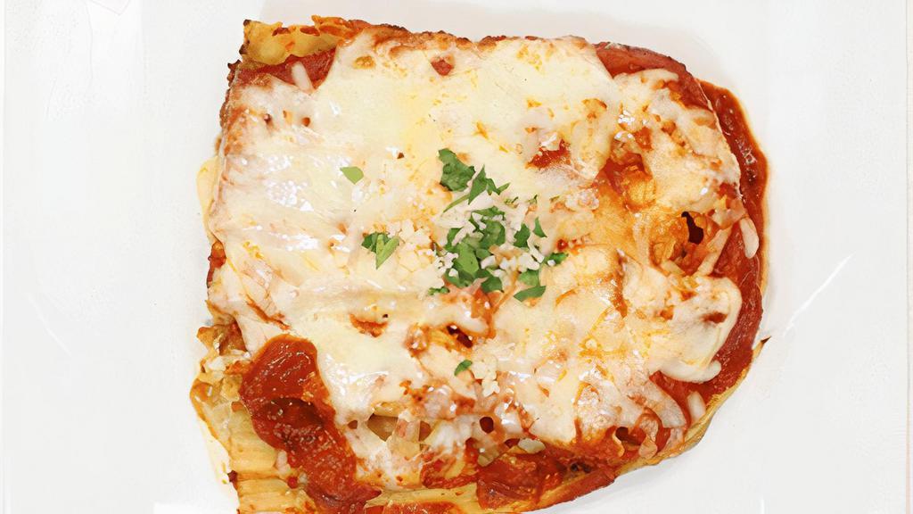 Lasagna · Layers of noodles, ground beef & ricotta cheese, topped with sauce and mozzarella cheese.