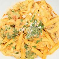 Penne Primavera · Penne tossed with broccoli, mushrooms & onions in a pink vodka sauce.