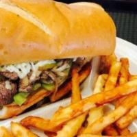 Philly Steak Sub · Grilled three oz. sirloin, green pepper, onion, homemade BBQ sauce. with Crispy Fries