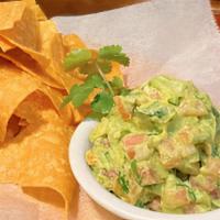 Guacamole · Made with house made tortilla chips.