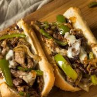 Italian Cheesesteak · Sliced steak with broccoli rabe and melted provolone on a hoagie roll.