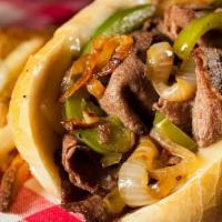 Cheeseless Steak · Sliced steak with grilled onions on a hoagie roll.
